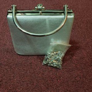 Shiny silver clutch